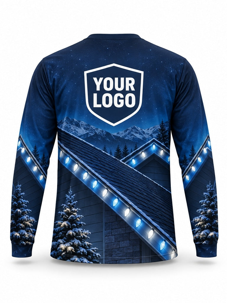 Back of Arctic Ridge Christmas light installer shirt: navy and royal blue with snowy roof gables lined in blue and white C9 lights under a mountain backdrop, large logo area
